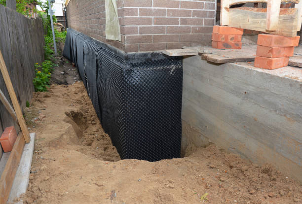 Happy homeowners after waterproofing job in Painesville